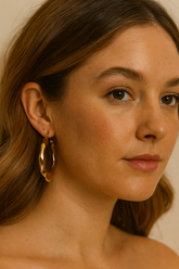 Sleek Twist Oval Hoops